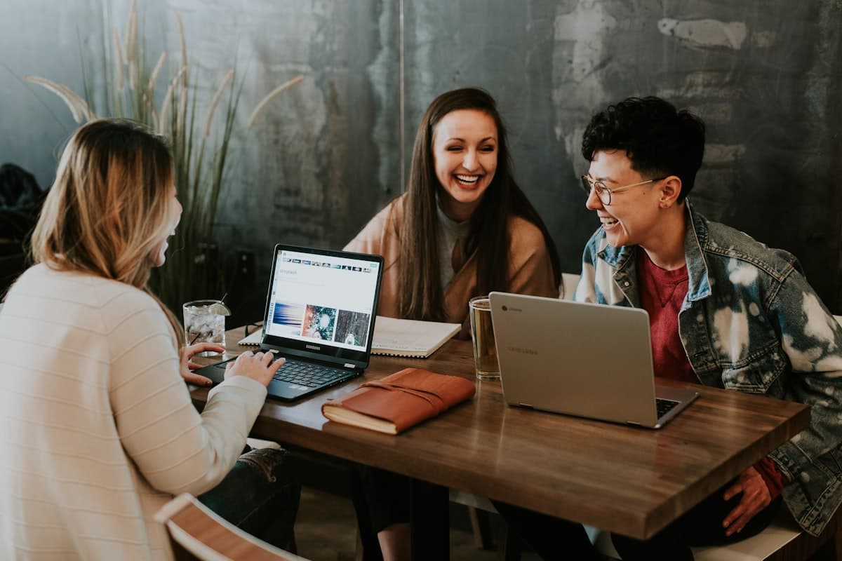 Students learning together on laptops with BrightView