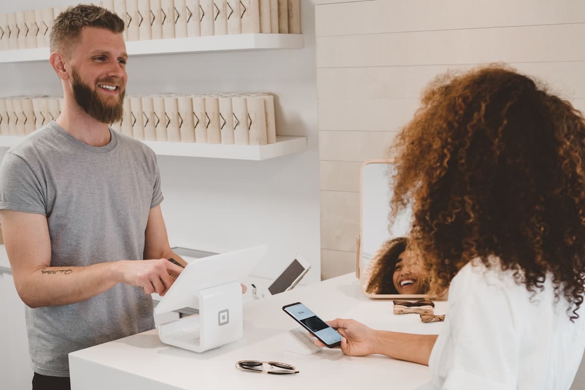 Customer paying at a store checkout